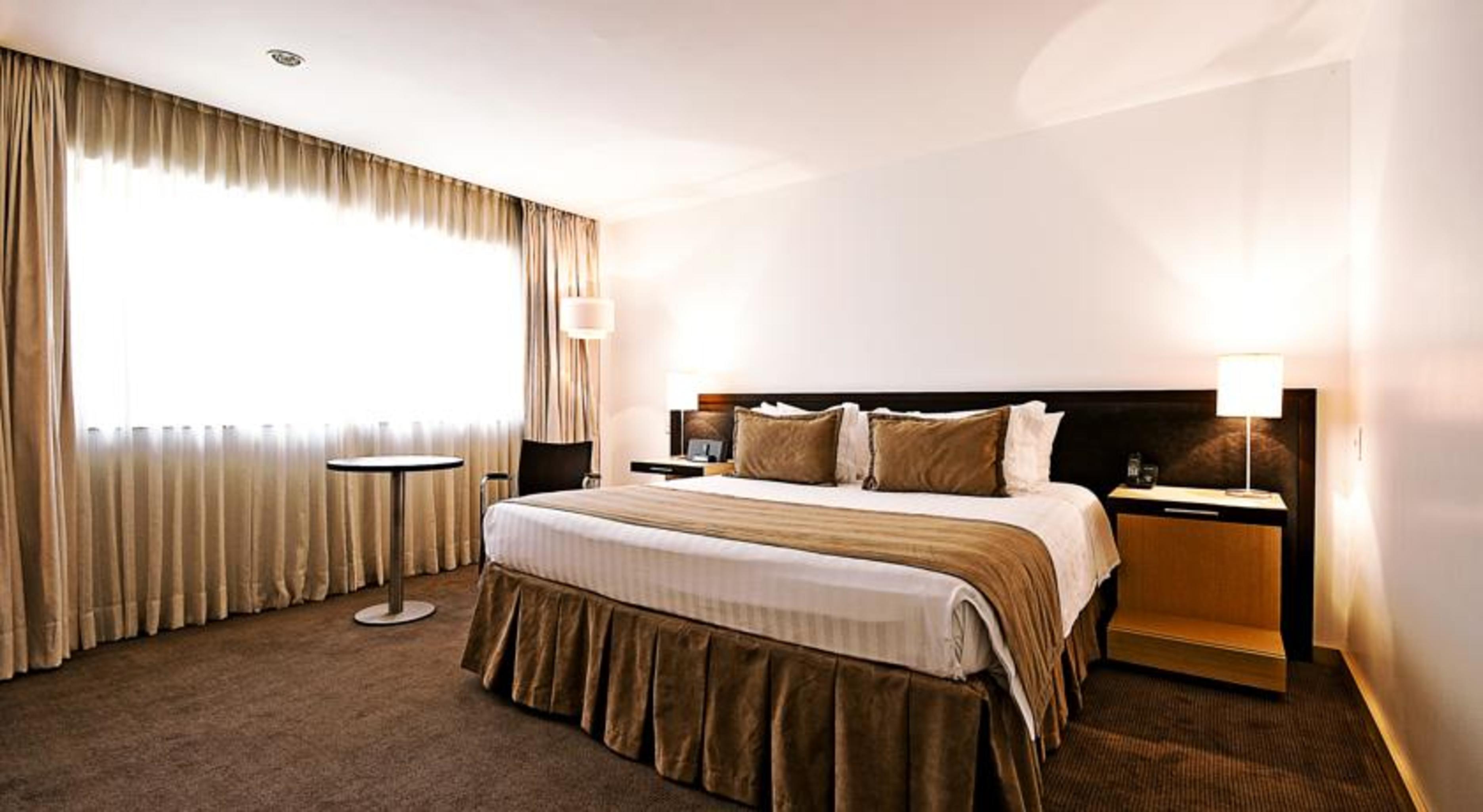 Movich Hotel Las Lomas Rionegro Exterior foto A bedroom at the hotel